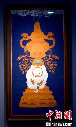 圖為5月16日，展覽中的新創(chuàng)唐卡作品《瑞象承香》?！±盍?攝
